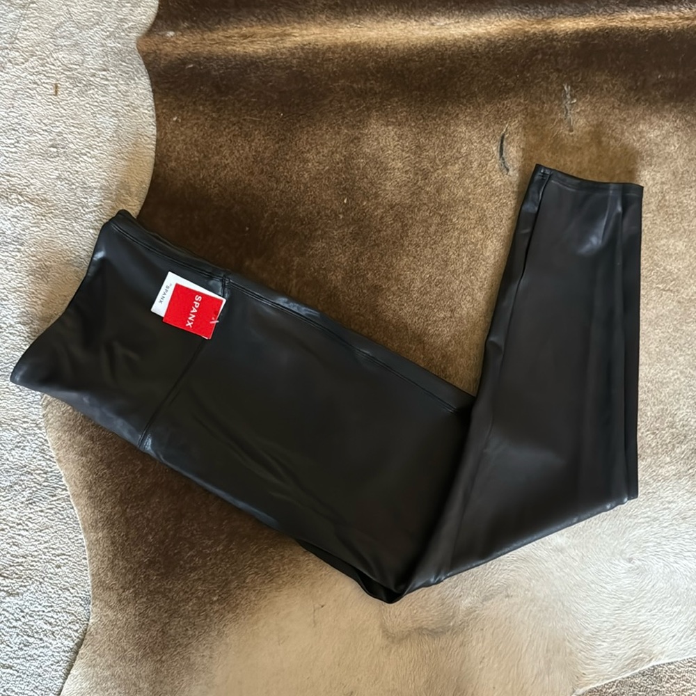 Brand new Spanx with tags.